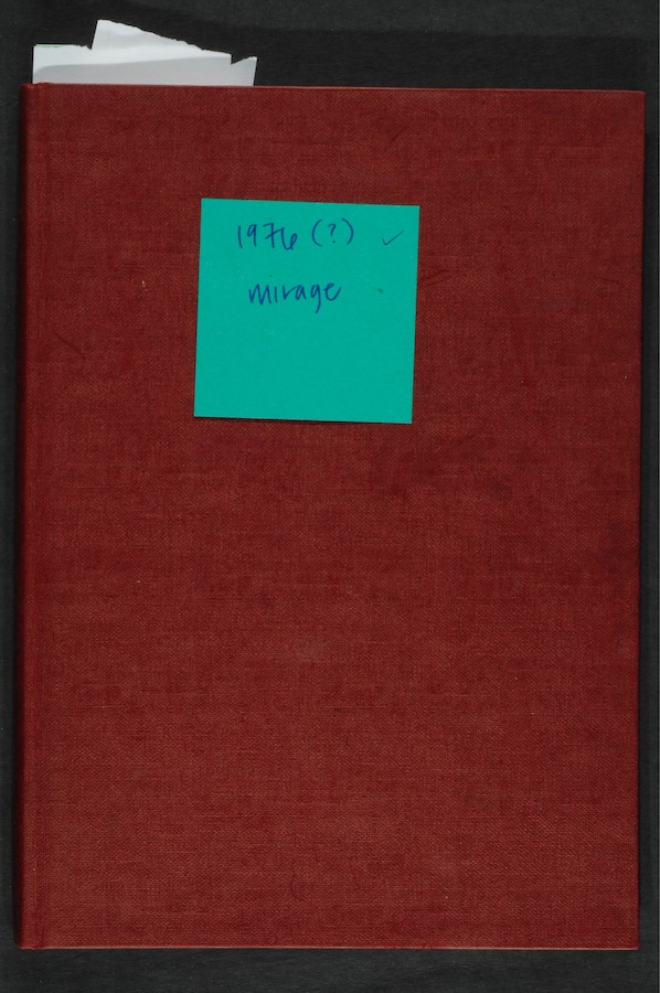 Cover of a notebook with a sticky note. Sticky note reads: “1976 (?) mirage”