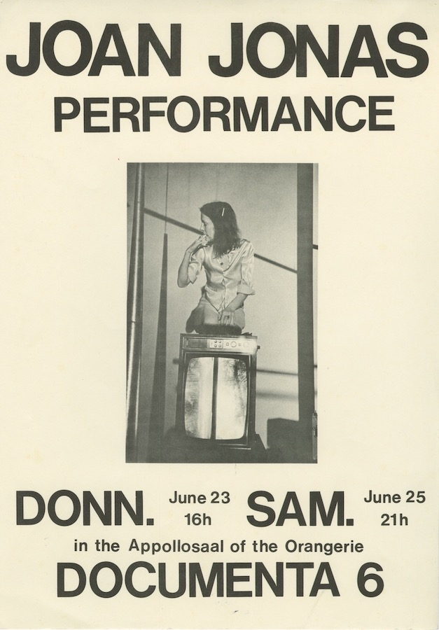 Poster for Jonas’s performance with an image of Jonas behind a TV monitor with her fingers in her mouth and text that reads: “Joan Jonas Performance, Donn. June 23 16h Sam. Jun 25 21h, in the Appollosaal of the Orangerie, Documenta 6”