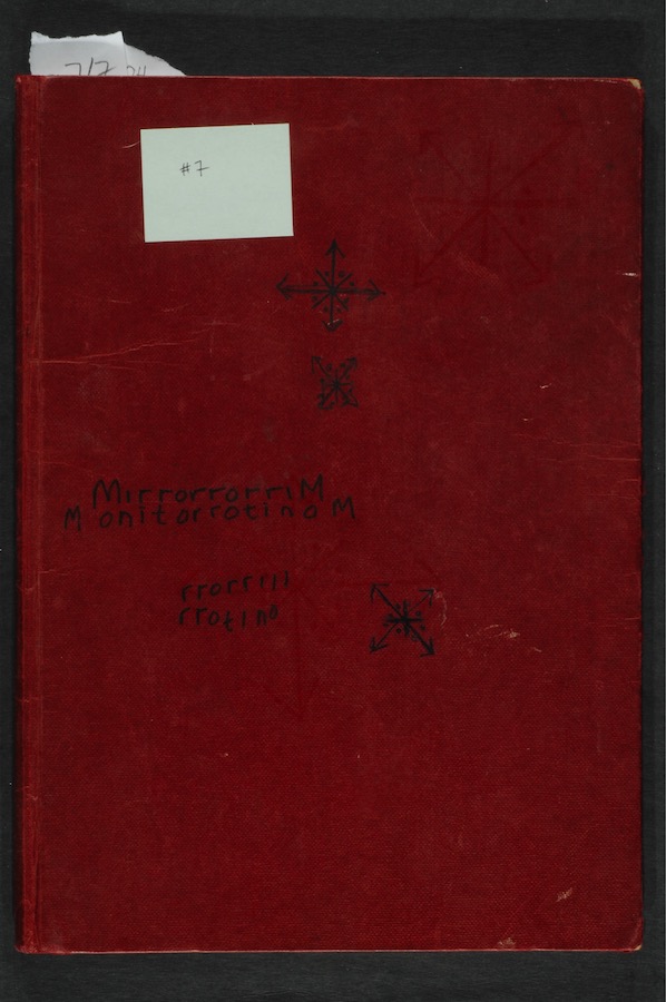 Notebook cover with a sticky note that reads “#7”, drawings, and words that read “MirrorrorriM, MonitorrotinoM, rrorrlll, rrotino”